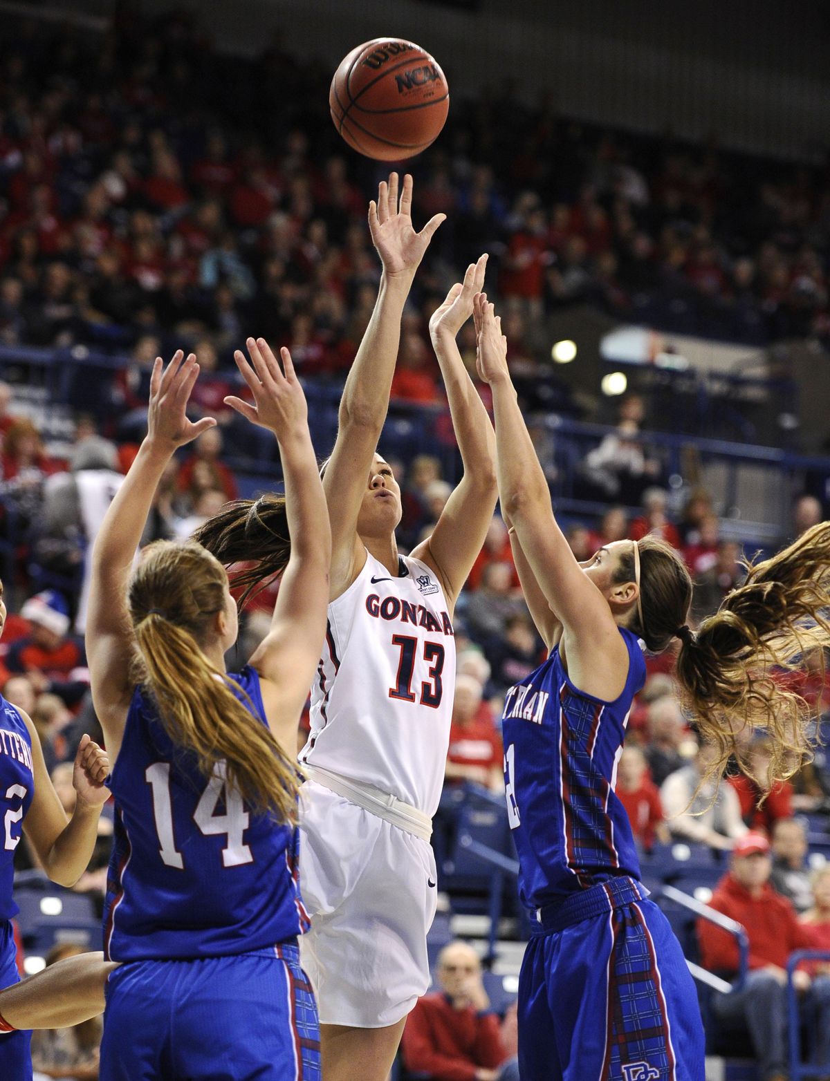 Gonzaga Bulldogs forward Jill Barta (13) goes up for a basket against Presbyterian Blue Hose guard Janie Miles (14) during an NCAA women’s college basketball game on Saturday, Dec. 3, 2016 at McCarthey Athletic Center in Spokane. (James Snook / Special to The Spokesman-Review)