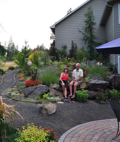 John and Maralee Karwoski have turned a challenging site in Eagle Ridge in south Spokane, into a luscious, hardy Mediterranean garden.  (PAT MUNTS)