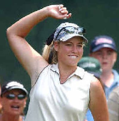 
Amateur Brittany Lincicome celebrates her birdie on the 17th hole during the first round of the U.S. Women's Open.  
 (Associated Press / The Spokesman-Review)