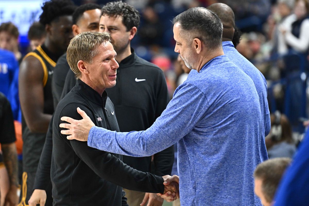 Gonzaga Bulldogs head coach Mark Few, left, greet Northwest Eagles head coach Rick Skeen before a NCAA exhibition basketball game on Sunday, Oct. 19, 2025, at the McCarthey Athletic Center in Spokane, WA. (James Snook/For The Spokesman-Review)