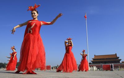 Dancers perform during a pre-Olympic celebration at Tiananmen Square Saturday in Beijing. (Associated Press / The Spokesman-Review)