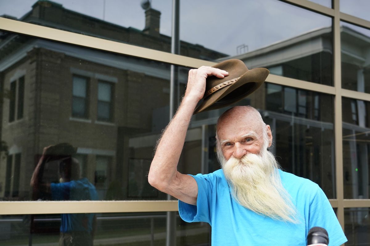 David Lidstone, an off-the-grid New Hampshire hermit known to locals as “River Dave,” doffs his hat after speaking to media Wednesday outside Merrimack County Superior Court after a status conference hearing in Concord, N.H.  (Elise Amendola)