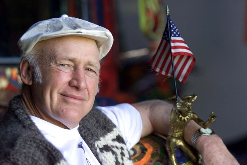 FILE - This April 7, 2000 file photo shows author Ken Kesey poses with his arm around the 