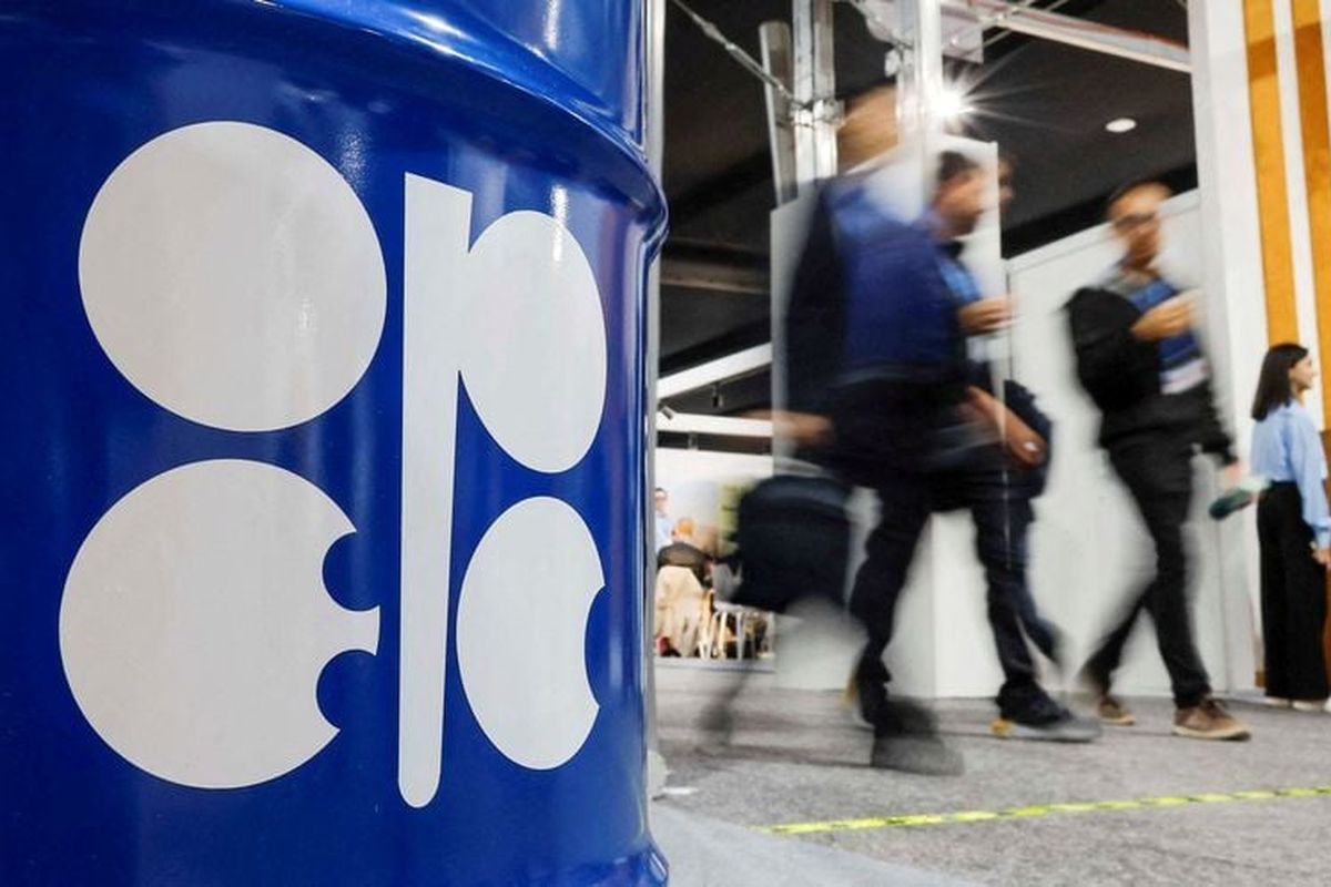 People walk past an installation depicting barrel of oil with the logo of Organization of the Petroleum Exporting Countries (OPEC) during the COP29 United Nations climate change conference in Baku, Azerbaijan November 19, 2024.   (Maxim Shemetov/Reuters)