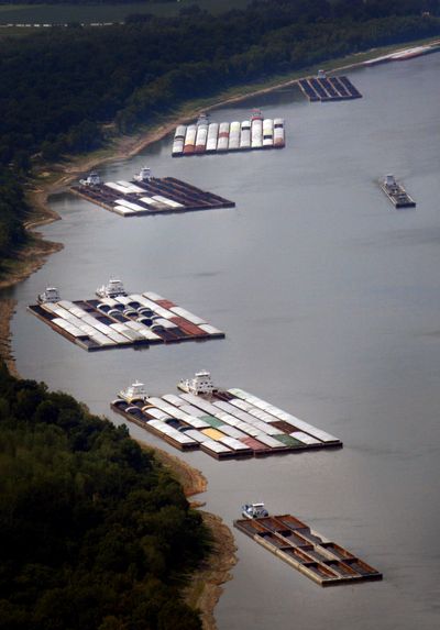 Hundreds of barges are stuck north and south of Greenville, Miss., due to low water on the Mississippi River Tuesday. (Associated Press)