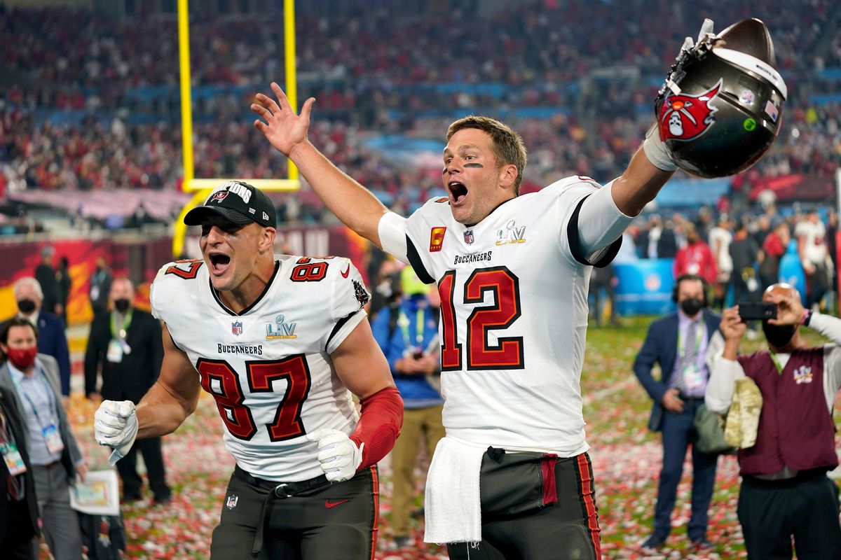 Tampa Bay Buccaneers tight end Rob Gronkowski, left, and quarterback Tom Brady (12) celebrate after the NFL Super Bowl 55 football game against the Kansas City Chiefs in Tampa, Fla., Feb. 7, 2021. Despite reports that he is retiring, Brady has told the Tampa Bay Buccaneers he hasn’t made up his mind, two people familiar with the details told The Associated Press, Saturday, Jan. 29, 2022.  (Associated Press)