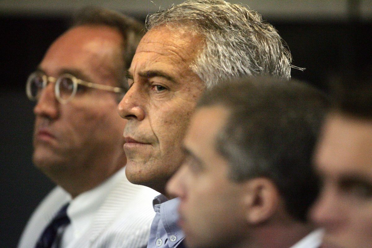FILE- Jeffrey Epstein appears in court in West Palm Beach, Fla., July 30, 2008. A modeling agent who was close to disgraced U.S. financier Jeffrey Epstein was found dead Saturday in his French jail cell, where he was being held in an investigation into the rape of minors and trafficking of minors for sexual exploitation, according to the Paris prosecutor