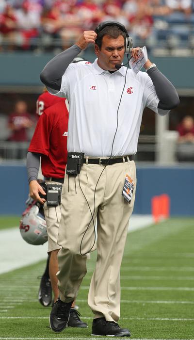 Paul Wulff’s Cougars open their conference season on Saturday. (Associated Press / The Spokesman-Review)