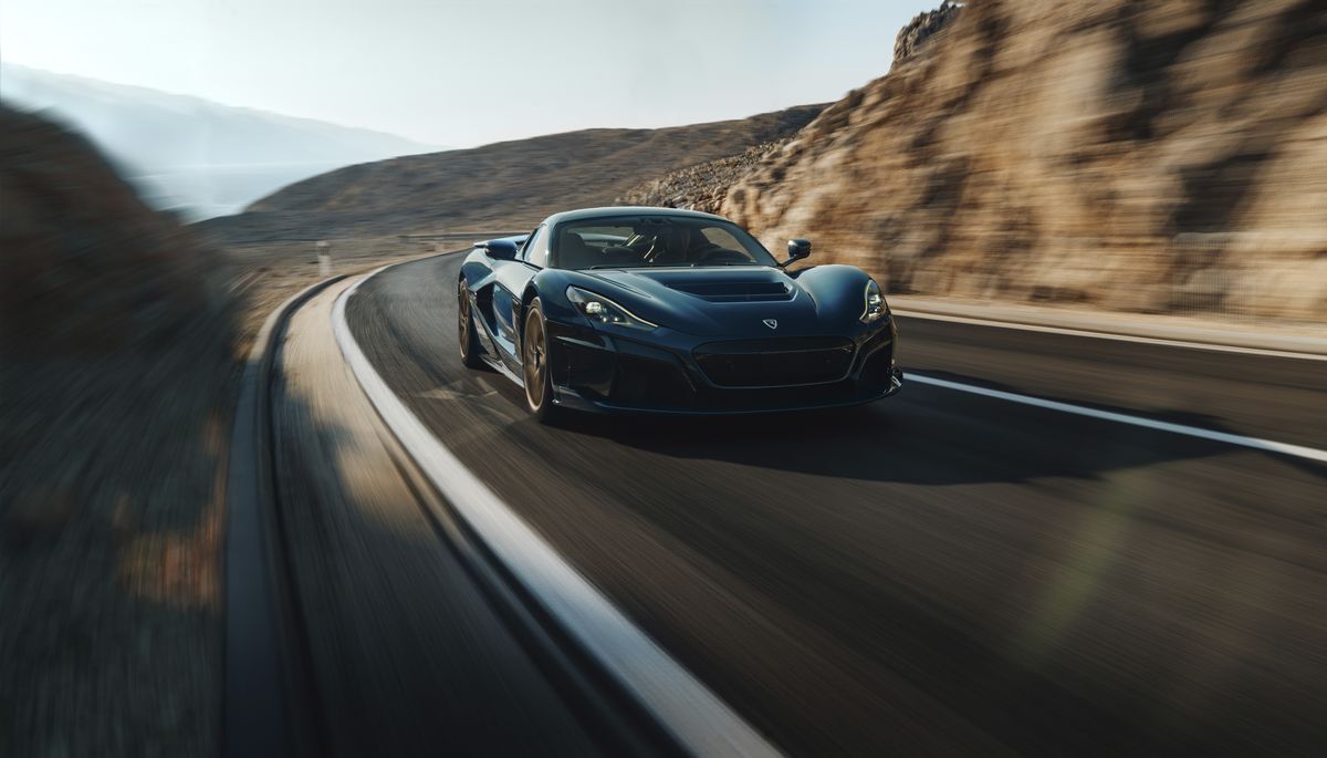 This handout photo provided by Rimac Automobili shows a Rimac Nevera electric car, at an undisclosed location in Croatia, April 15, 2021. Croatia’s electric supercar maker is taking over the iconic French manufacturer Bugatti in a deal that is reported to be worth millions of euros. The Croatian car producer, Rimac Automobili, says that Germany’s Volkswagen Group, including the Porsche division — which owns a majority stake in Bugatti — is to create a new joint venture which will be called Bugatti-Rimac. (Philipp Rupprecht)