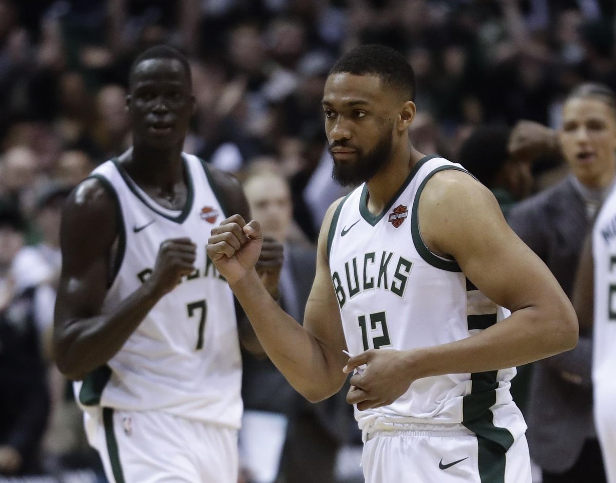 Milwaukee Bucks’ Thon Maker (7) and Jabari Parker celebrate after Game 4 of an NBA basketball first-round playoff series Sunday, April 22, 2018, in Milwaukee. The Bucks won 104-102. (Morry Gash / Associated Press)