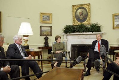 
President Bush and first Lady Laura Bush meet with members of Congress on the fifth anniversary of the No Child Left Behind Act on Monday in the White House. Bush also met with House and Senate Republicans to discuss his plan for the war in Iraq.
 (Associated Press / The Spokesman-Review)