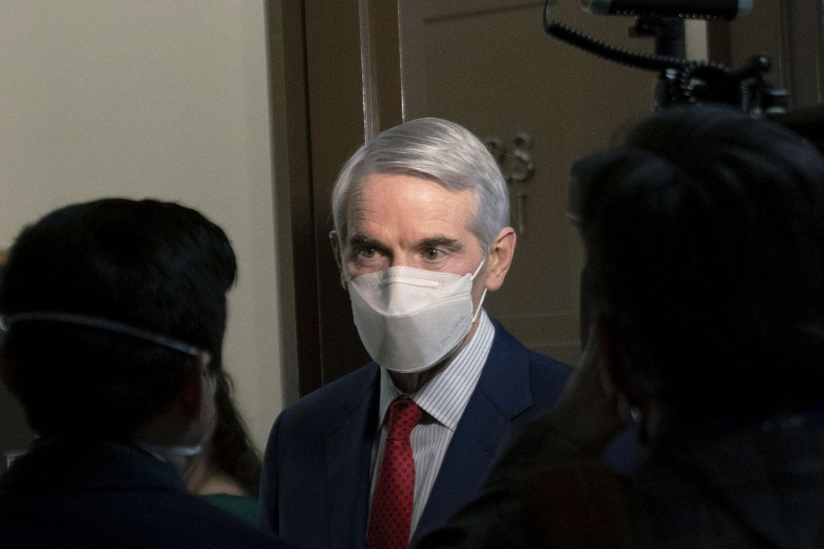 FILE - In this Jan. 19, 2021 file photo, Sen. Rob Portman, R-Ohio, speaks to members of the media outside a Senate Finance Committee hearing on Capitol Hill in Washington. Portman said Monday, Jan. 25 that he won