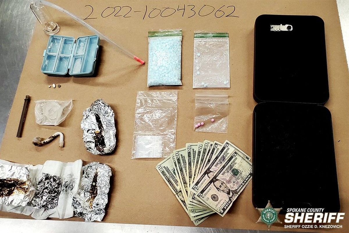Spokane County Sheriff’s Office deputies seized fentanyl, oxycodone, methamphetamine, drug paraphernalia and cash during a traffic stop in mid-April.  (Courtesy of Spokane County Sheriff