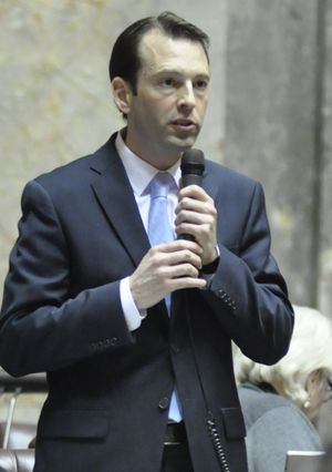 OLYMPIA -- State Sen. Andy Billig argues for an amendment to put new charters schools under the control of local school districts during a Senate debate Wednesday. (Jim Camden/The Spokesman-Review)