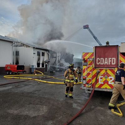 Crews battle a fire June 9 at a Couer d’Alene Police Department building, which stores expensive, high-end equipment for the department.  (Courtesy of Couer d'Alene Fire Department)