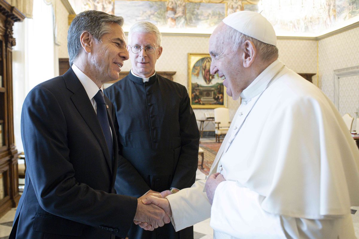 Pope Francis shakes hands with Secretary of State Antony Blinken, as they meet at the Vatican, Monday, June 28, 2021. Blinken is on a week long trip in Europe traveling to Germany, France and Italy.  (Vatican Media)