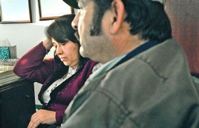 
Margarita Casillas, left, and her husband, Magdaleno, contemplate their next move Friday at a Spokane lawyer's office to get their 2-year-old daughter  back from state custody. On Tuesday, an Adams County judge ordered that the child be returned to the couple after they settle in their new home.
 (Brian Plonka / The Spokesman-Review)