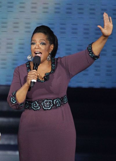 Oprah Winfrey acknowledges fans during May’s star-studded double-taping of “Surprise Oprah! A Farewell Spectacular,” in Chicago. (Associated Press)