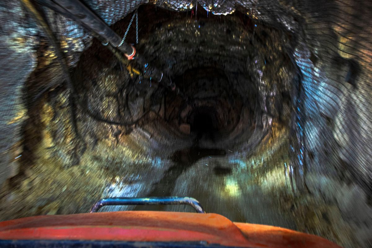 An ATV is driven into the entrance of the Bunker Hill Mine in Wardner, Idaho on Tuesday, March 30, 2021. New investors are using a more environmentally friendly method as they reopen the mine.  (Kathy Plonka/The Spokesman-Review)