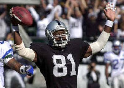 
The days of celebrating touchdowns in Oakland appear over for receiver Tim Brown. 
 (Associated Press / The Spokesman-Review)
