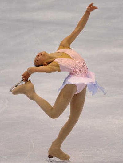 
Mao Asada skates to a victory in the ladies short program.
 (Associated Press / The Spokesman-Review)