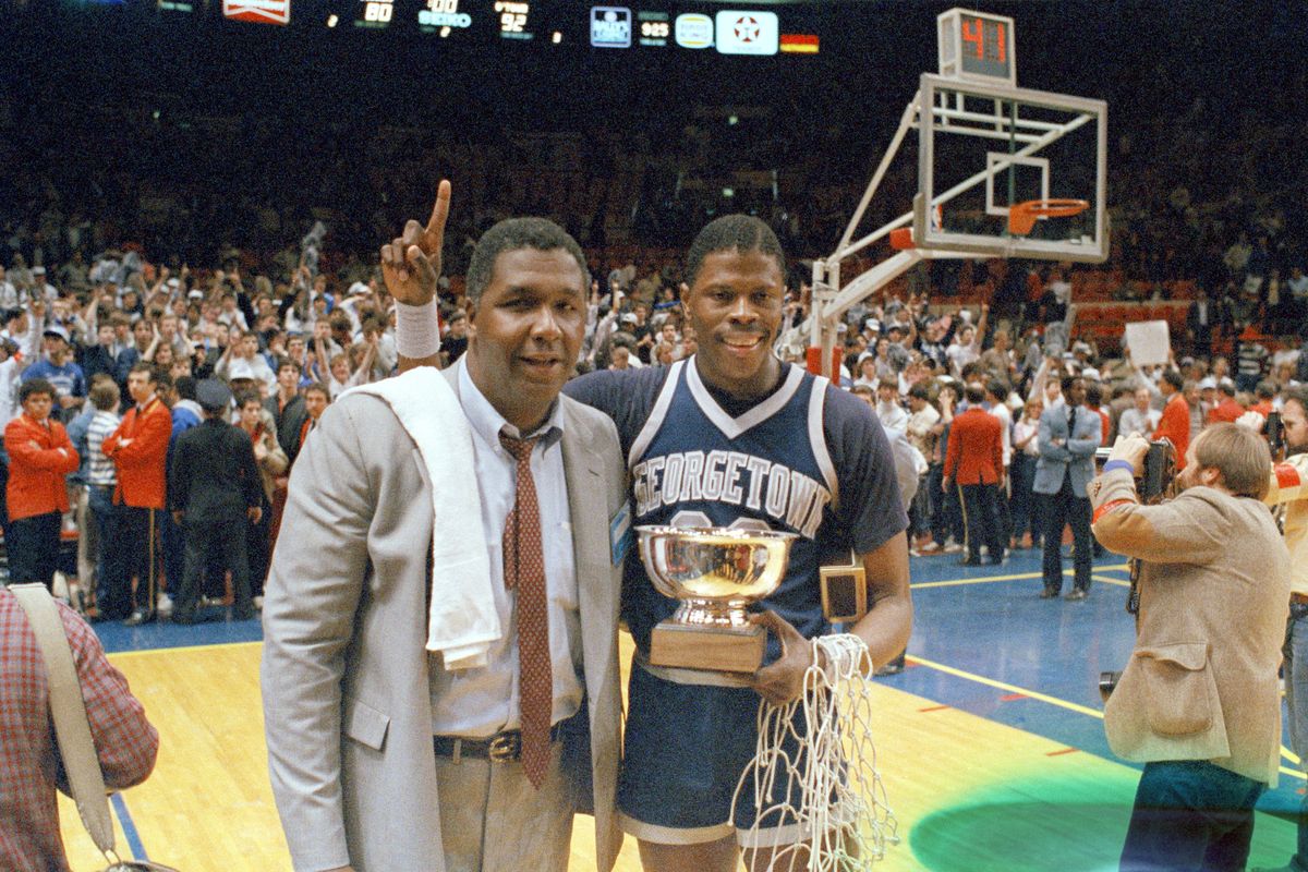 In this March 9, 1985, photo, Georgetown basketball coach John Thompson stands with center Patrick Ewing after the Hoyas defeated St. John’s in the Big East Championship in New York.  (STF)