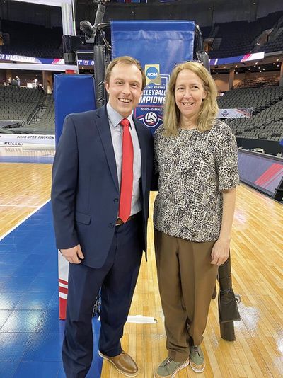 Courtesy of Dale Goodwin Spokane officials Ben Goodwin and Margie Ray pose for a photo at the 2021 NCAA volleyball championships in Omaha, Neb., earlier this month.  (SSR)