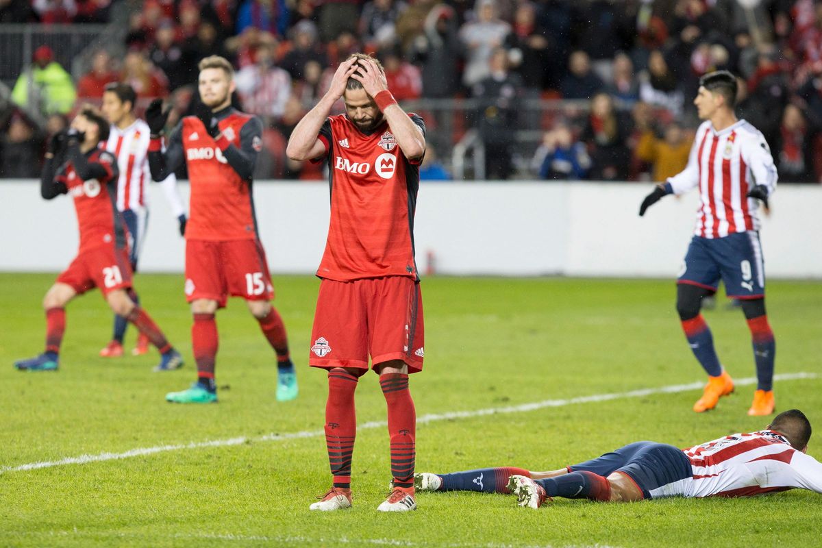 Toronto FC’s Drew Moor reacts after missing a goal-scoring chance against Guadalajara during the second half in the first leg of the CONCACAF Champions League soccer final, Tuesday, April 17, 2018, in Toronto. (Chris Young / Canadian Press via AP)