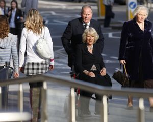 Britain's Camilla, the Duchess of Cornwall, in wheelchair,arrives at the Polish Social and Cultural Association in London to sign  the book of condolence for the Polish President Lech Kaczynski, who died in a plane crash, Thursday, April 22, 2010. The Polish President, his wife and some of the country's most prominent defence and civilian leaders died April 10, 2010 along with many others when the presidential plane crashed as it came in for landing in thick fog at Smolensk in western Russia. Camilla is in a wheelchair because of her broken left leg which she sustained on April 7 during hill walking in Scotland. (Sang Tan / Associated Press)