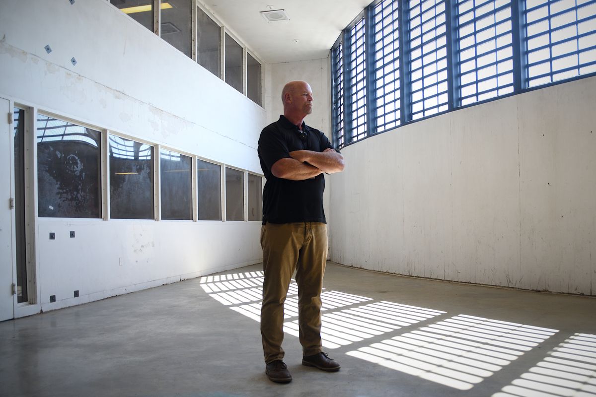 Spokane County Senior Director of Law and Justice Mike Sparber stands in an inmate recreation area Aug. 15 during a tour of the jail.  (Colin Tiernan/The Spokesman-Review)