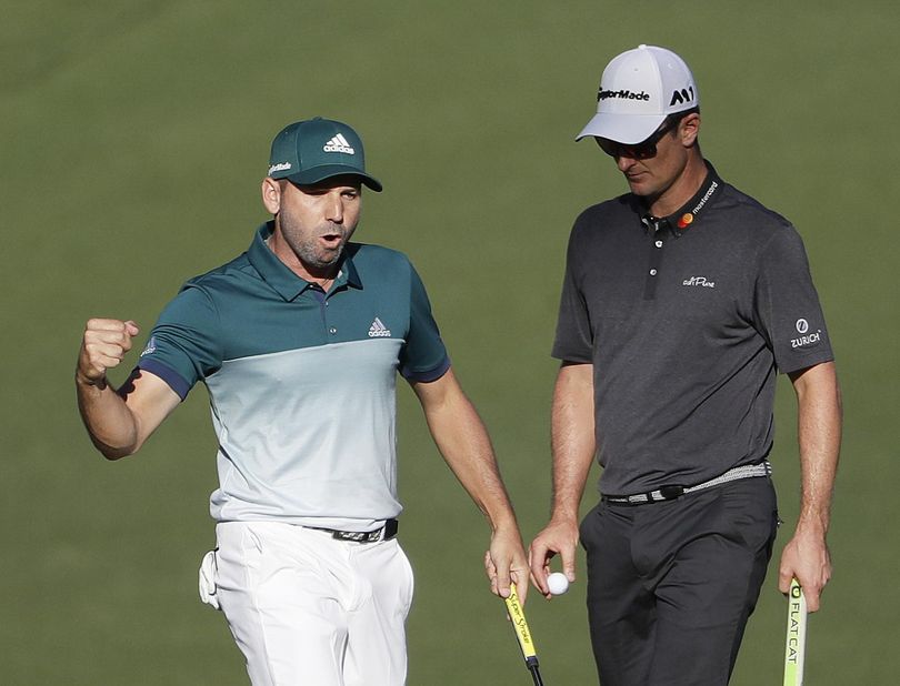 Sergio Garcia, of Spain, reacts in front of Justin Rose, of England, after making an eagle putt on the 15th hole during the final round of the Masters golf tournament Sunday, April 9, 2017, in Augusta, Ga. Garcia went on to defeat Rose in a playoff to win a major tournament for the first time. (David Goldman / Asscociated Press)