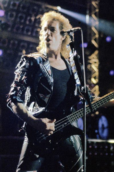 Francis Buchholz of the Scorpions performs in London in 1989.   (Tribune News Service )
