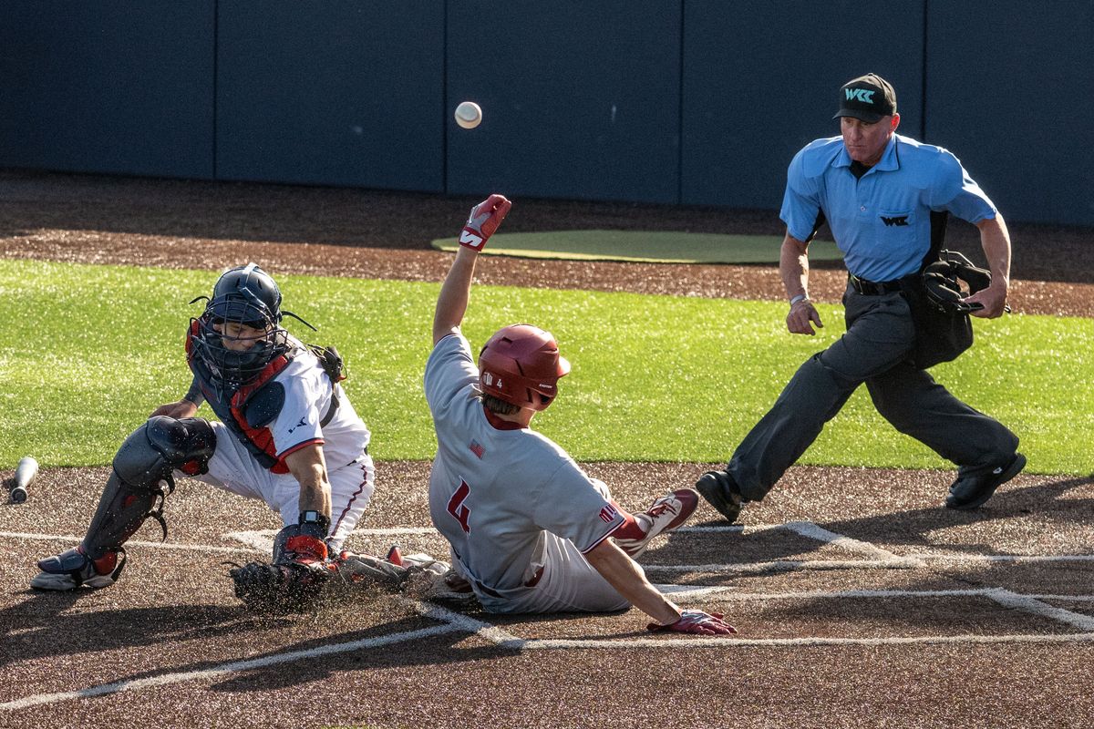 WSU’s Giguere Alexandre (4) slides safely into home during the top or the fourth inning during a NCAA college baseball game with Gonzaga, Monday, May 4, 2026, at Gonzaga University.  (Colin Mulvany/The Spokesman-Revi)
