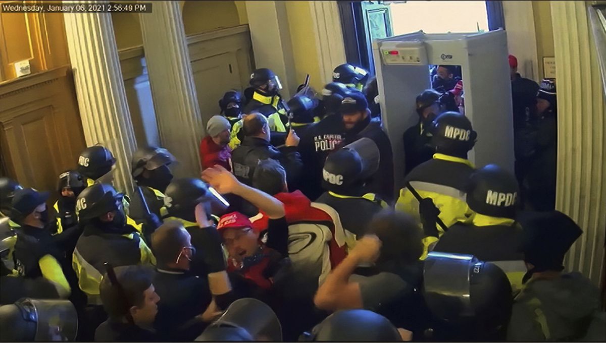 In this image from video, security video is shown to senators as House impeachment manager Rep. Eric Swalwell, D-Calif., speaks during the second impeachment trial of former President Donald Trump in the Senate at the U.S. Capitol in Washington, Wednesday, Feb. 10, 2021.  (HOGP)