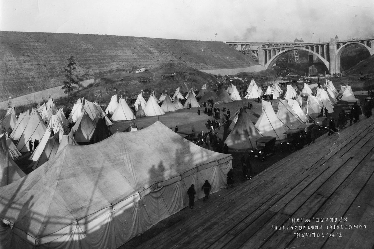 In 1925, Native Americans from the Spokane region met for the National Indian Congress. The tribes set up tents and tepees in the Peaceful Valley area of downtown Spokane. The Monroe Street bridge is in the background.  (PHOTO SUBMITTED BY JACK AND DOLORES MADER)