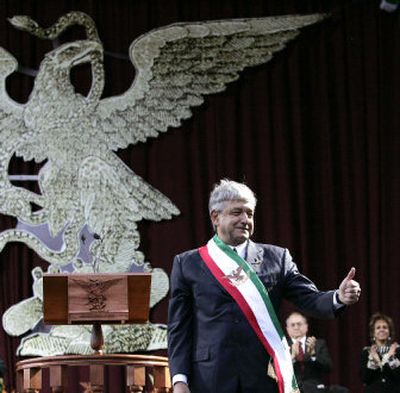 
Andres Manuel Lopez Obrador reacts after being sworn in as the country's 