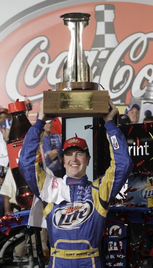 Kurt Busch celebrates completing a sweep of May races at Charlotte Motor Speedway. (Associated Press)
