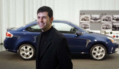 
Lon Zaback, chief designer of the Focus, stands next to a redesigned Focus. 
 (Associated Press / The Spokesman-Review)