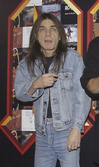 A March 3, 2003 file photo of AC/DC co-founder and guitarist Malcolm Young at an event in London. (Yui Mok / Associated Press)