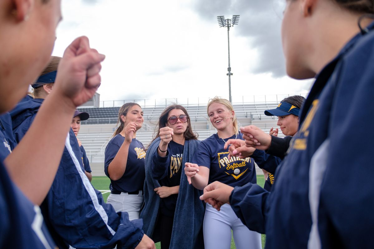 Mead softball breaks the huddle before practice on Tuesday at Union Stadium in Mead.  (Madison McCord/For The Spokesman-Review)