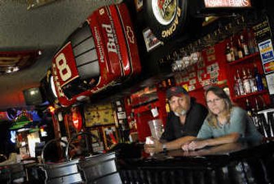 
Ken and Karen Bigelow at the Top Hat Pub and Grill, paid a contractor a down payment for new awnings and never received the work promised. 
 (Brian Plonka / The Spokesman-Review)