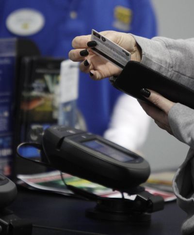 The Federal Reserve on Tuesday issued new rules to protect credit card users. (File Associated Press)