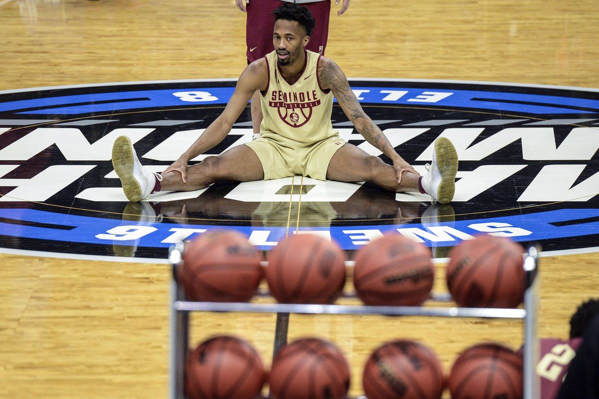 Florida State guard Braian Angola stretches during practice, Wednesday, March 21, 2018, at the Staples Center in Los Angeles. (Dan Pelle / The Spokesman-Review)