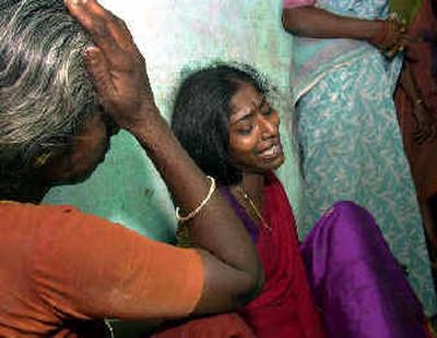 
Relatives of victims of a fire weep at the hospital in Kumbakonam, about 215 miles southwest of Madras, India
 (Associated Press / The Spokesman-Review)