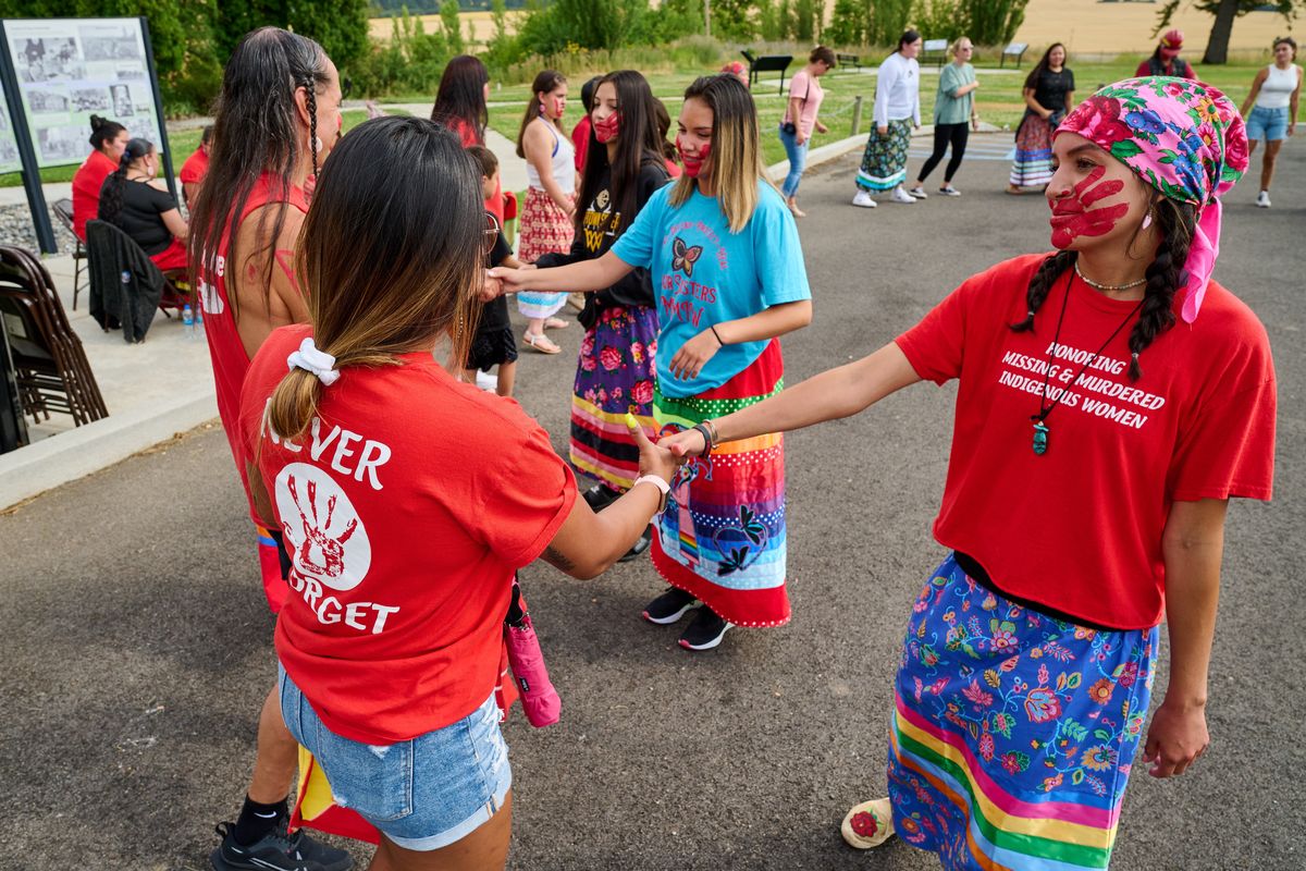 During a ceremony honoring missing and murdered indigenous women, participants perform a traditional Native American circle dance Tuesday in Desmet, idaho  (COLIN MULVANY/THE SPOKESMAN-REVIEW)