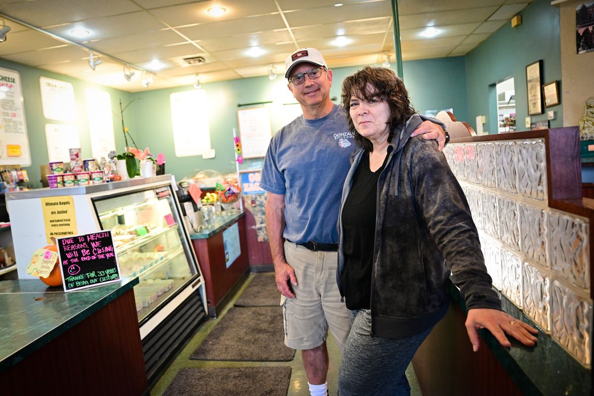 Christi Chapman and her partner, John Manlowe, pose for a photo on Wednesday at The Ultimate Bagel. The Ultimate Bagel will be closing in the third week of November after more than 30 years.  (Tyler Tjomsland/The Spokesman-Review)