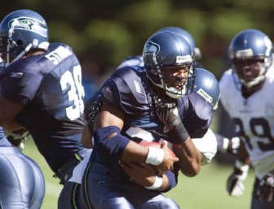 
Seattle Seahawks running back Shaun Alexander said departed players are just part of business in the NFL. Associated Press
 (Associated Press / The Spokesman-Review)