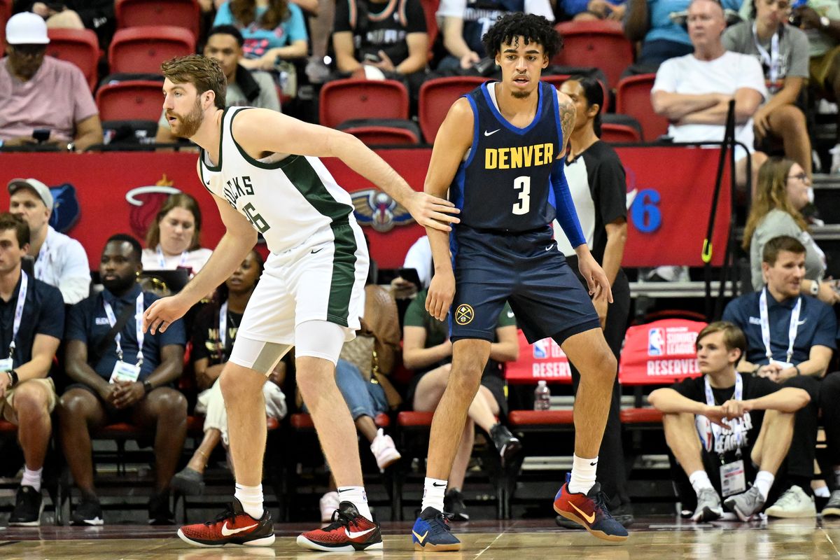 Milwaukee Buck’s Drew Timme guards against the Denver Nuggets’ Julian Strawther during an NBA Summer League game on Friday, July 7, 2023, at the Thomas & Mack Center in Las Vegas, Nev.  (Tyler Tjomsland/The Spokesman-Review)