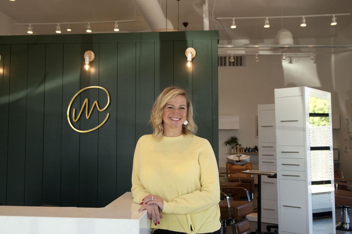 Tamera Cole, owner of The Mix Salon and Day Spa at Ponderosa Village development in Spokane Valley is photographed on Friday July 26, 2019. (Kathy Plonka / The Spokesman-Review)