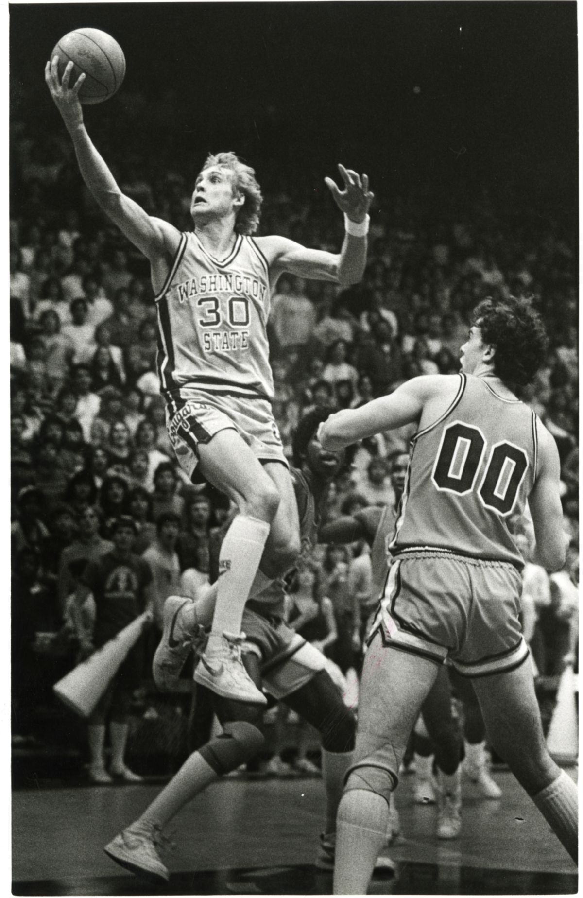 Craig Ehlo helped the Cougars to second place in the Pac-10 in 1983, followed by an NCAA tournament berth.   (Archive photos / The Spokesman-Review)